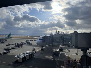 Plane boarding at international airport bound for Thailand
